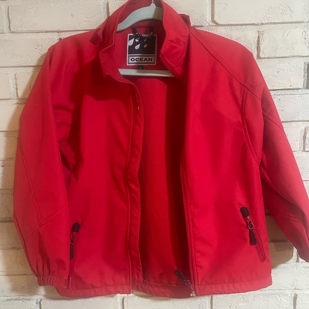 OCEAN Size 9 Youth rain coat.Adjustable waist as shown.EUC